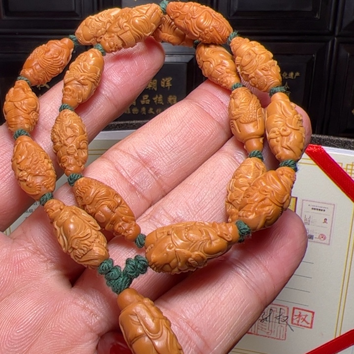 梦***3橄榄核手串十八罗汉