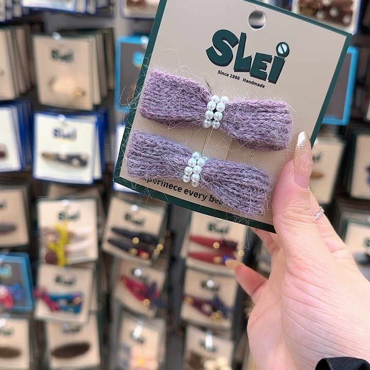 紫色蝴蝶结珍珠鸭夹