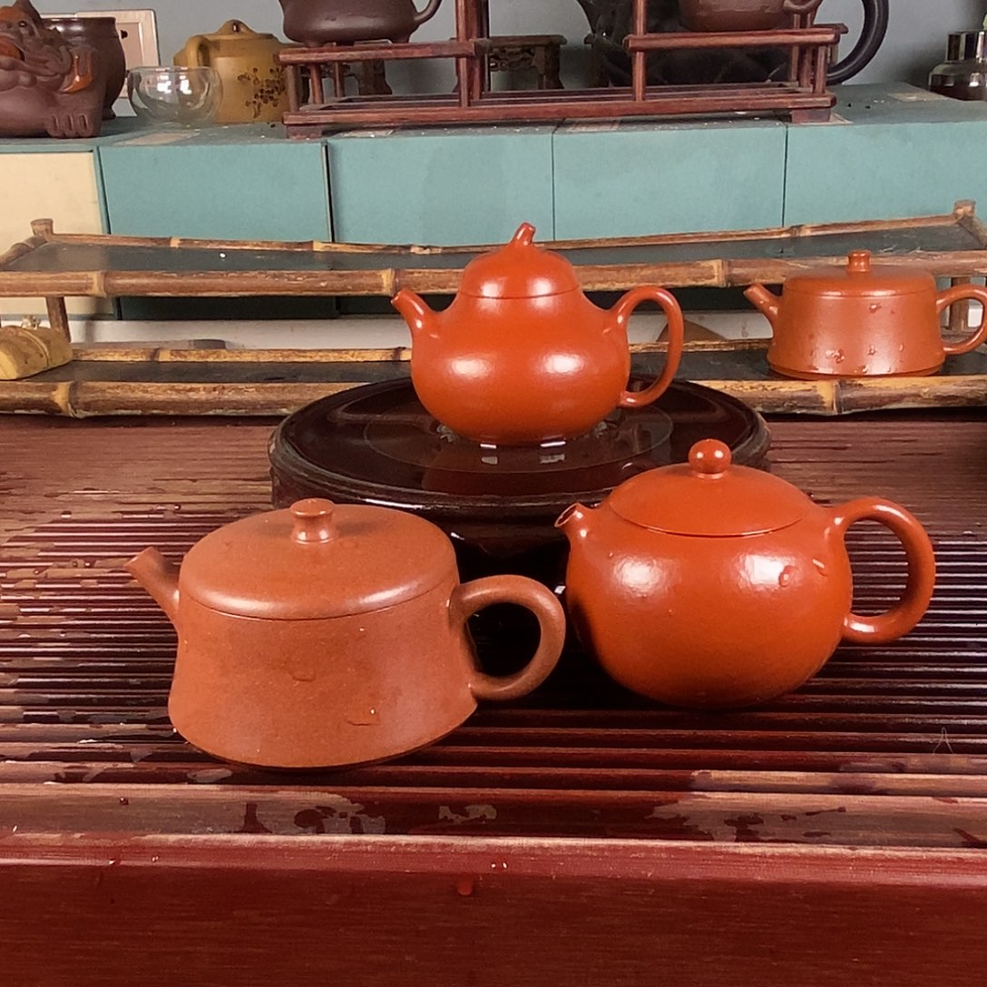 紫砂茶壶朱泥茄瓜。西施 云柱
