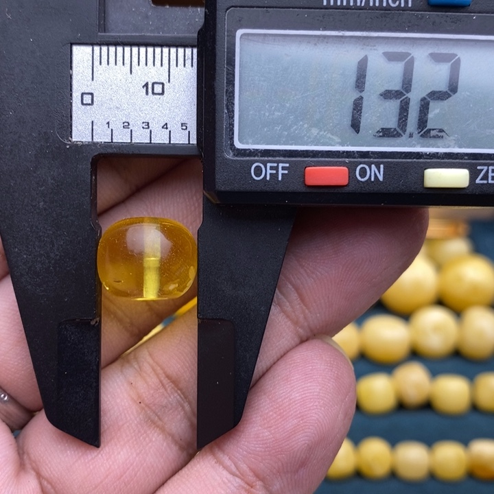 琥珀未镶嵌裸石58号13.2*10.6喇叭口微瑕