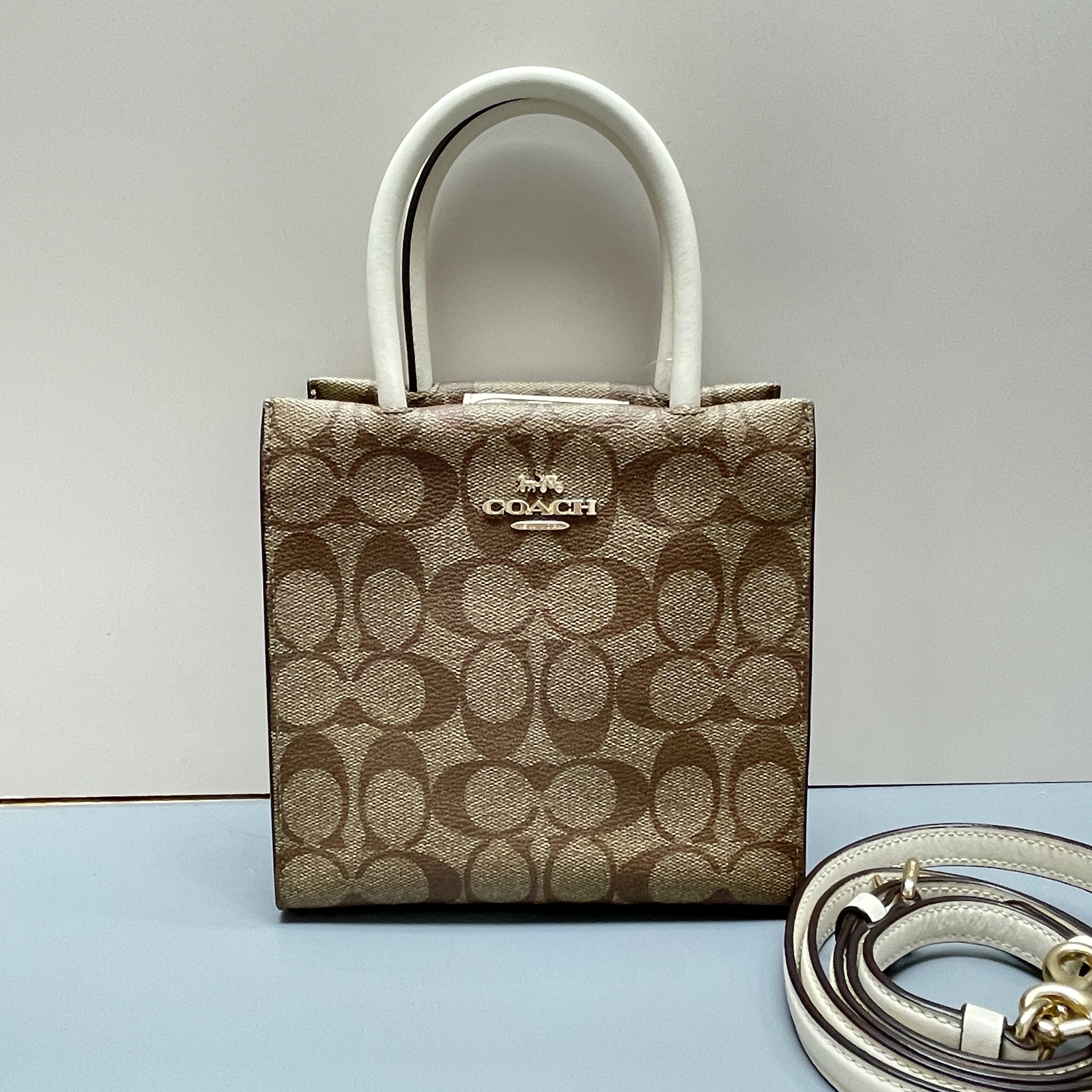 95新 COACH/蔻驰 cally17白拼老花琴谱包17*17*8cmEM122309托特包