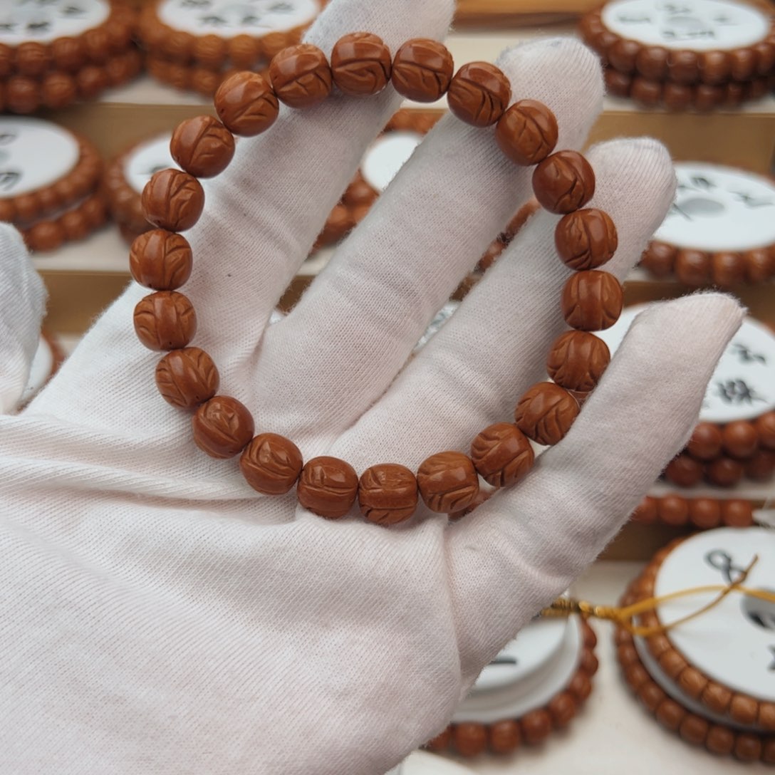 桃核手串“**龙桃核手串