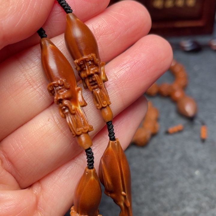 橄榄核吊坠凝****）橄榄核