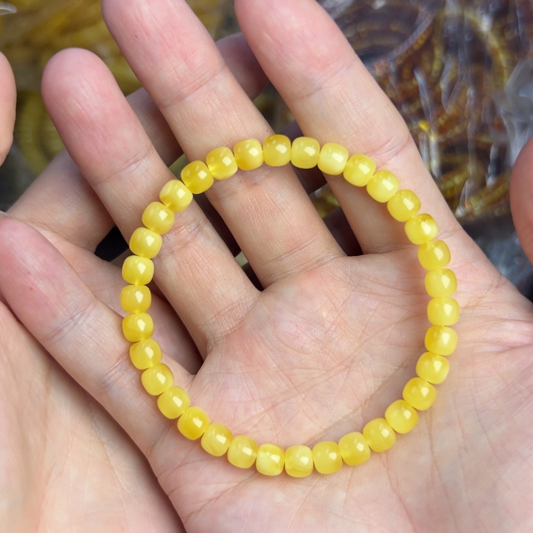 琥珀未镶嵌戒指6.6老型鸡油黄050