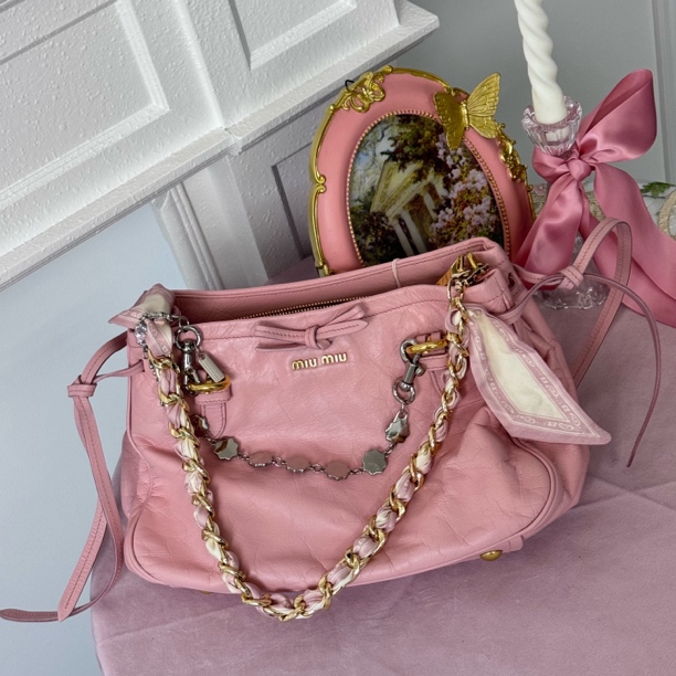 95新 MIU MIU/缪缪 miumiu粉色蝴蝶结机车包斜挎包