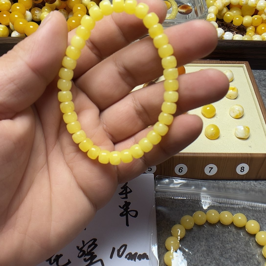 树脂非金属老型6*5白花蜜手链