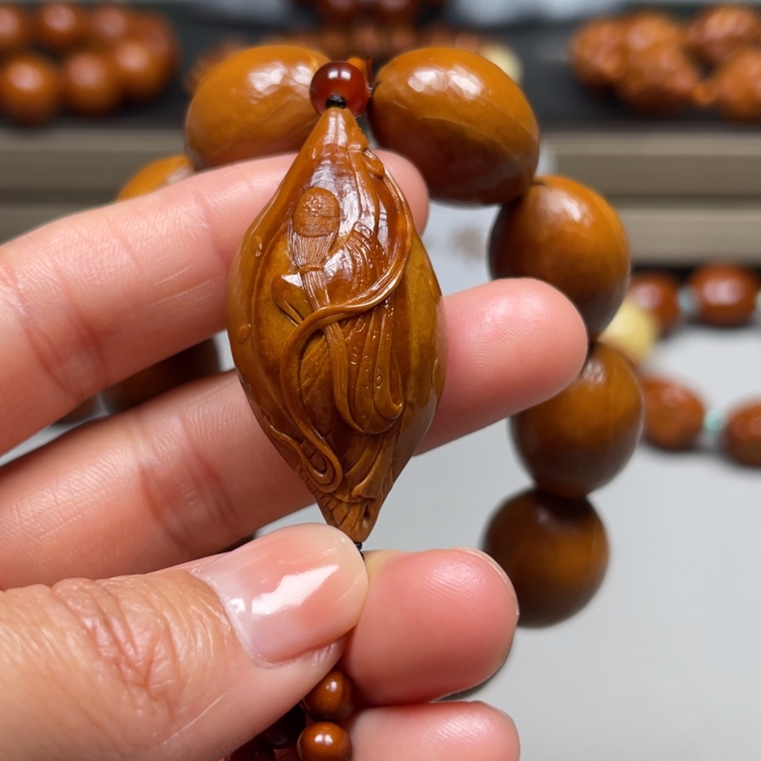 吊坠橄榄核听雪下的声音