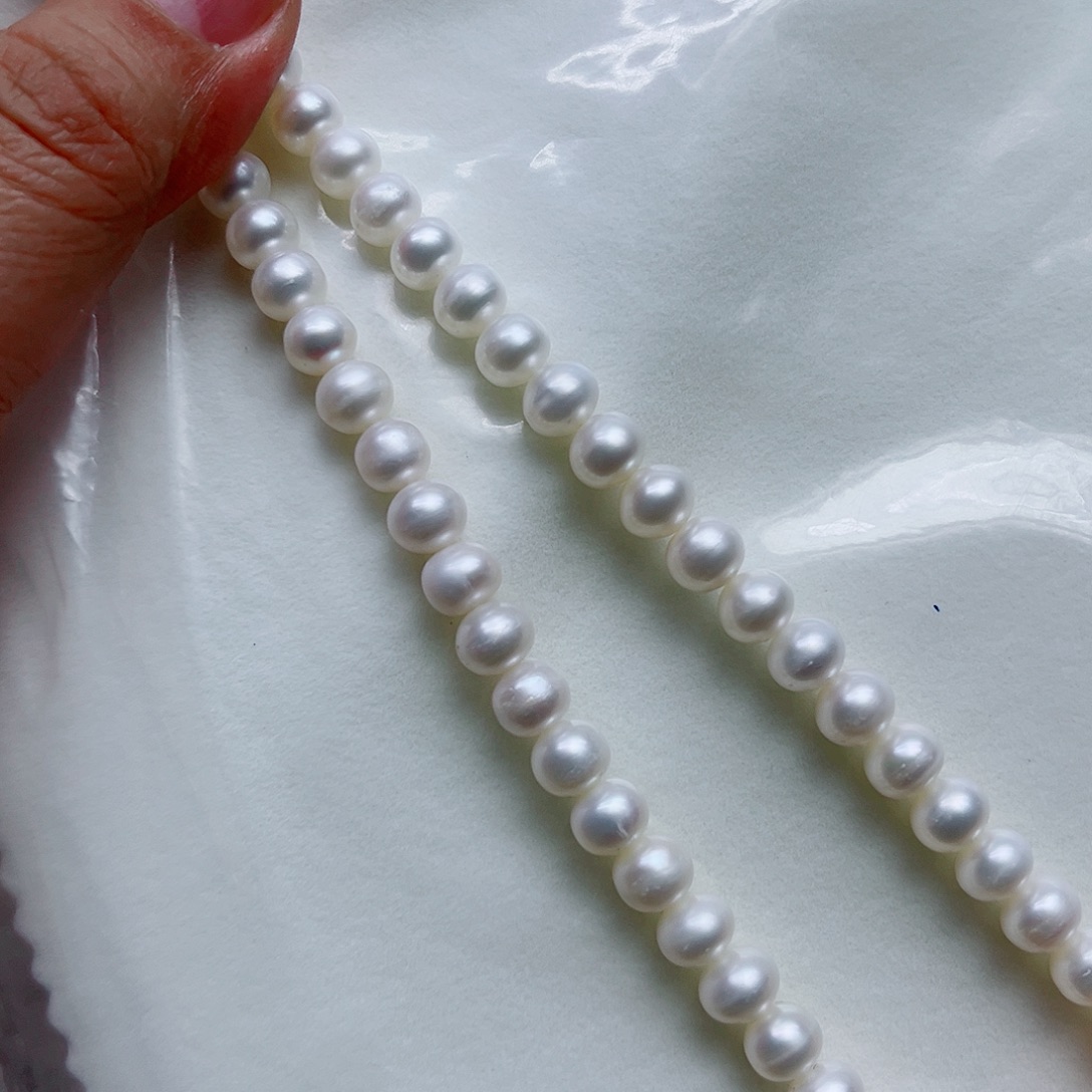 淡水珍珠银S925镶嵌耳饰