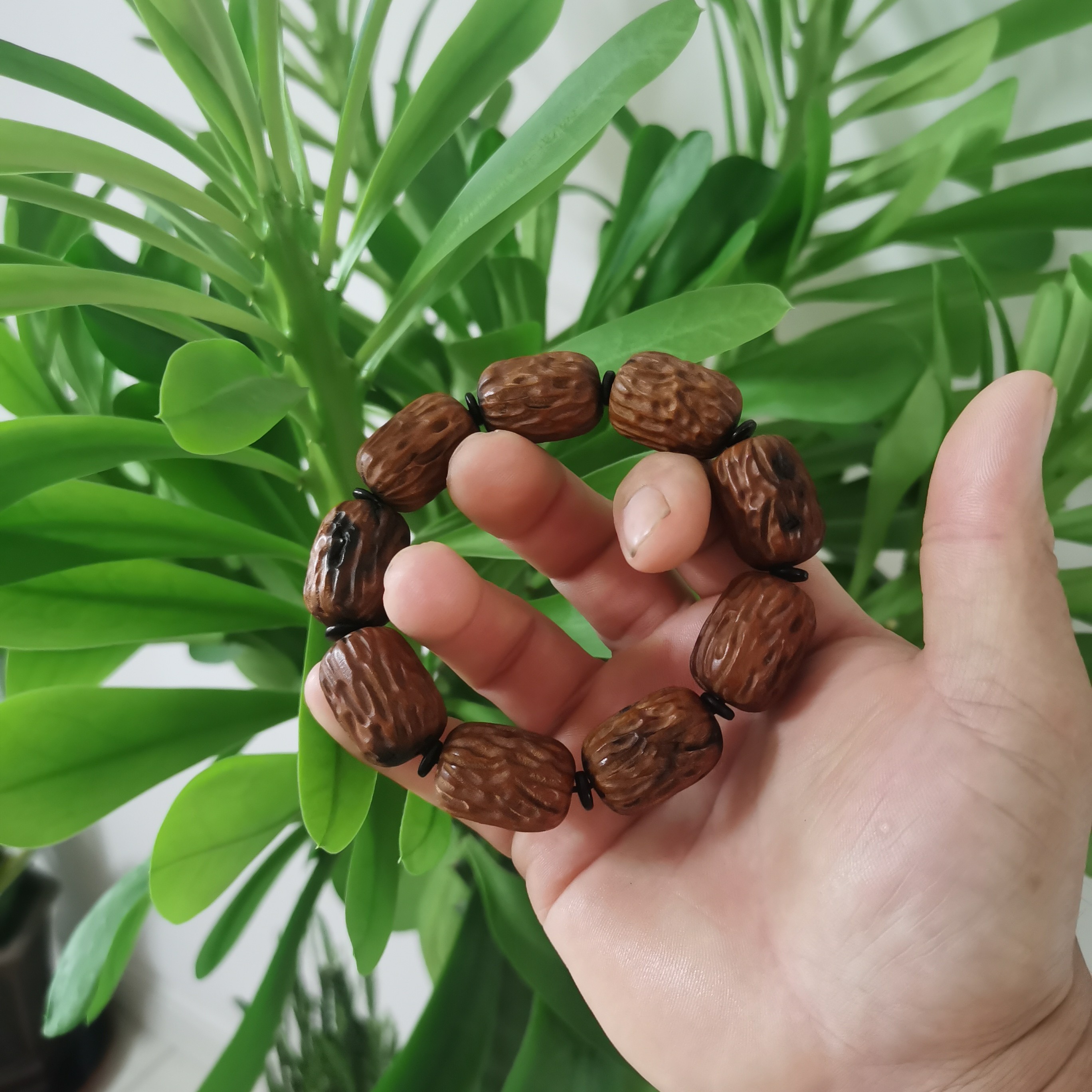 放漏款（雷击枣木形精雕手串）
