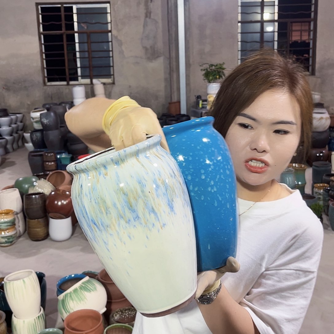紫砂花盆正品口14高25。z z