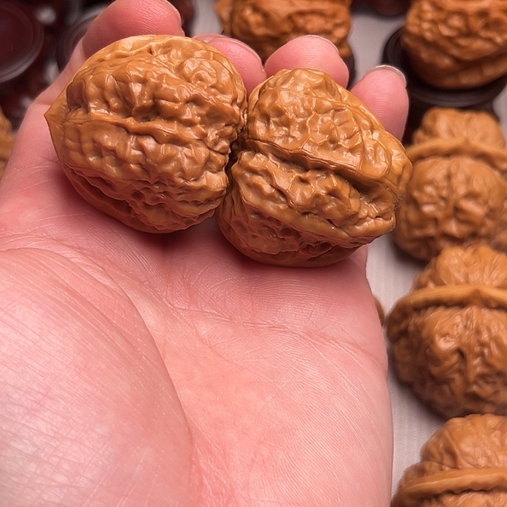 湫***书桃核吊坠文玩核桃手把件