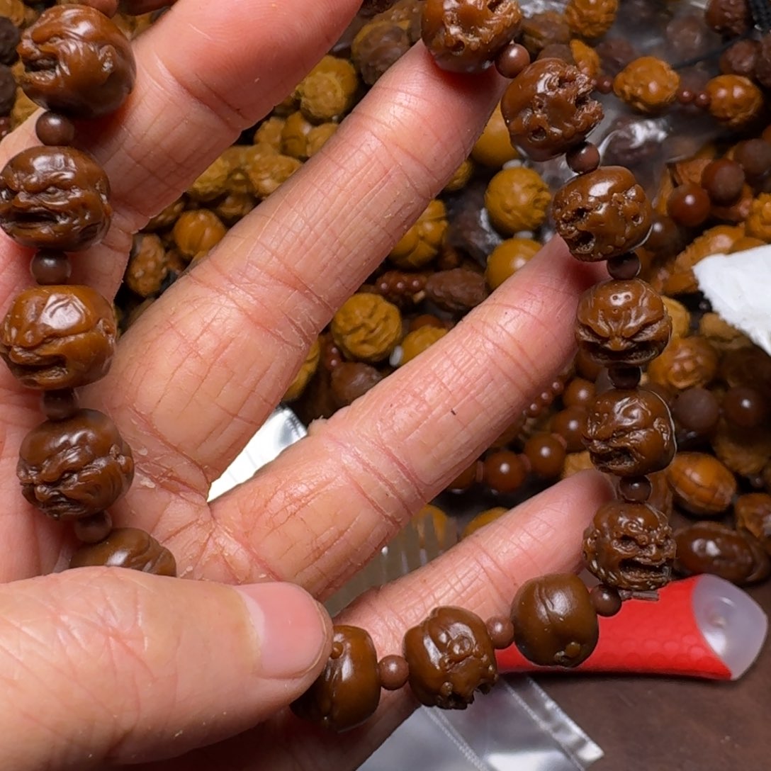 手串橄榄核你的电话