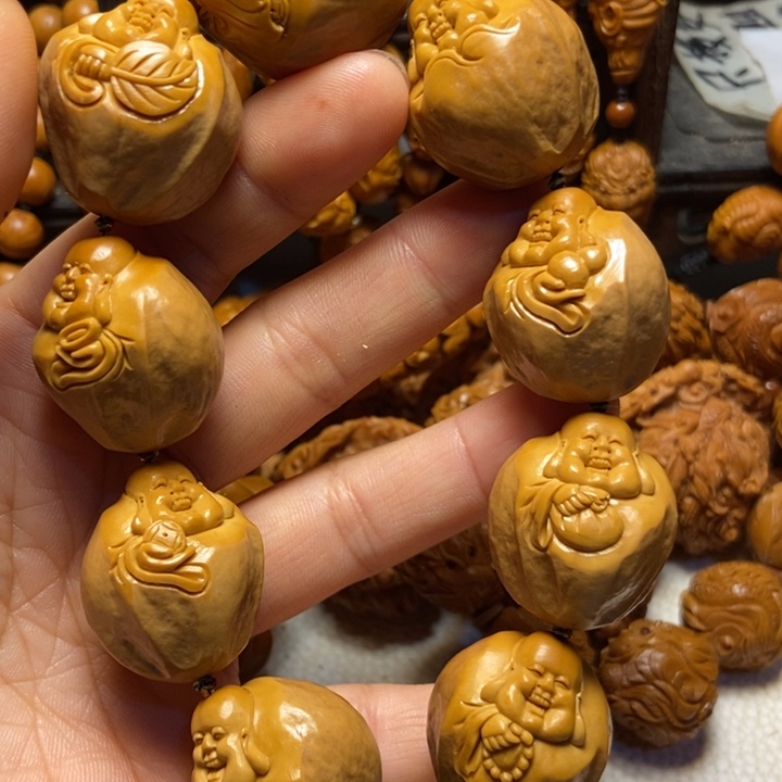 【闪购商品】橄榄核手串/手链卸****戎手工包衣弥勒2.5