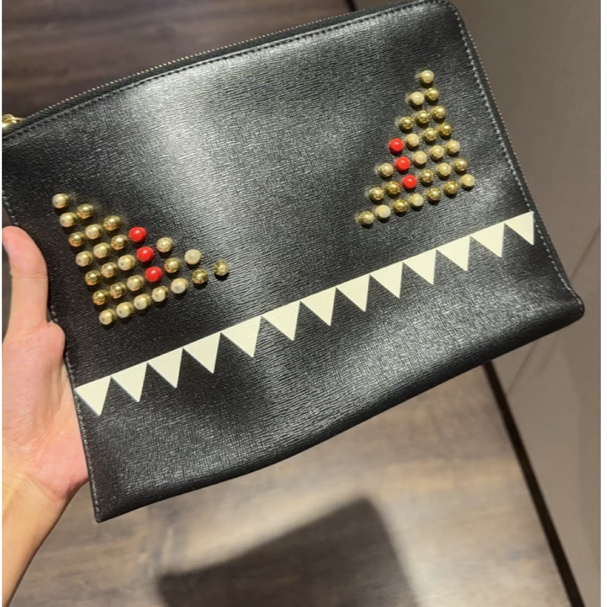 99新 FENDI/芬迪 芬迪黑色锯齿手拿包h810