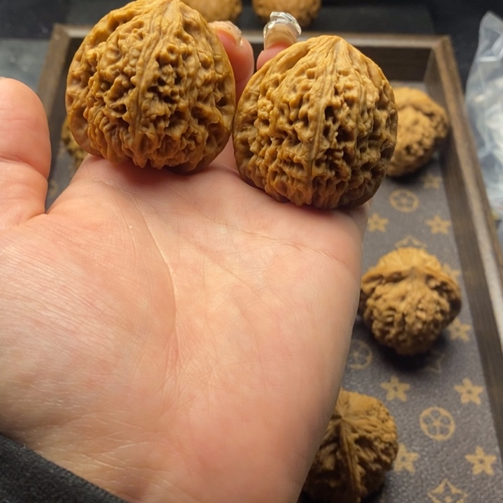 桃核把件姚*姚南疆石文玩核桃