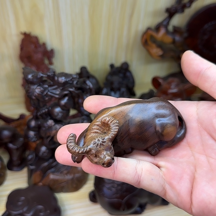 木黑檀木10双色卧牛一只
