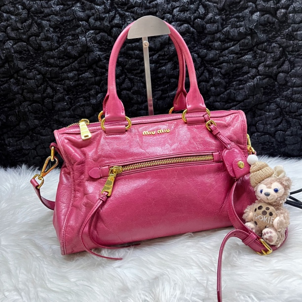 95新 MIU MIU/缪缪 缪缪玫粉色机车斜挎包