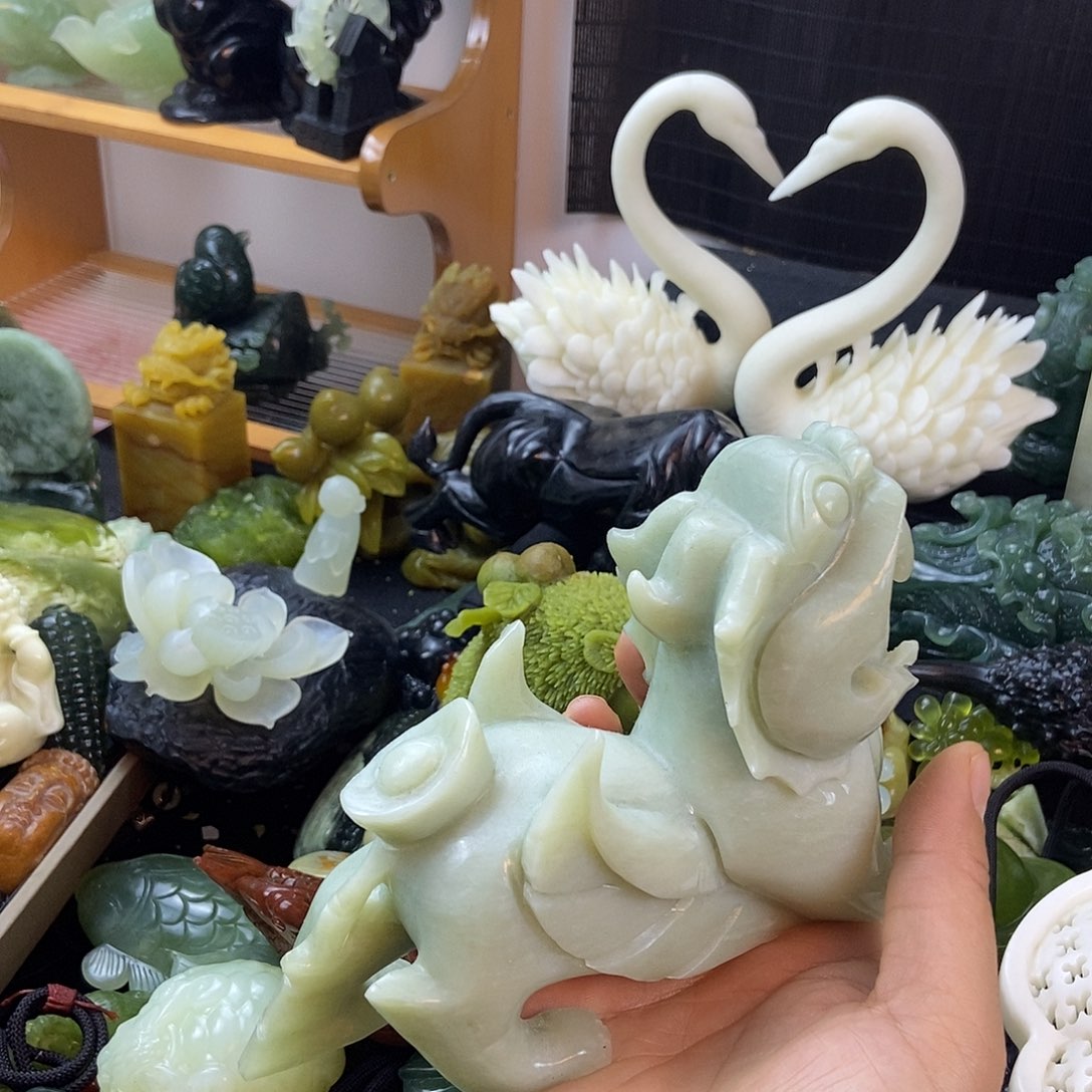 小***哥合金蛇纹石玉手把