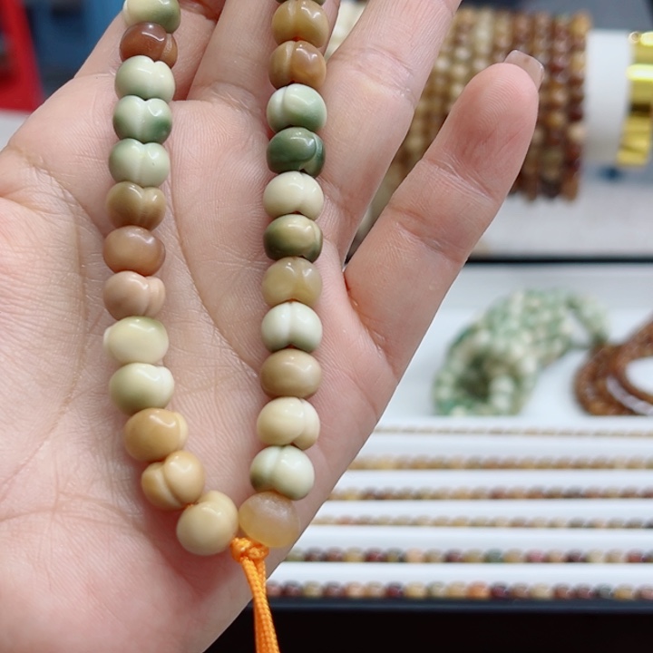 小***淘吊坠龙脊菩提卡10多宝屁桃