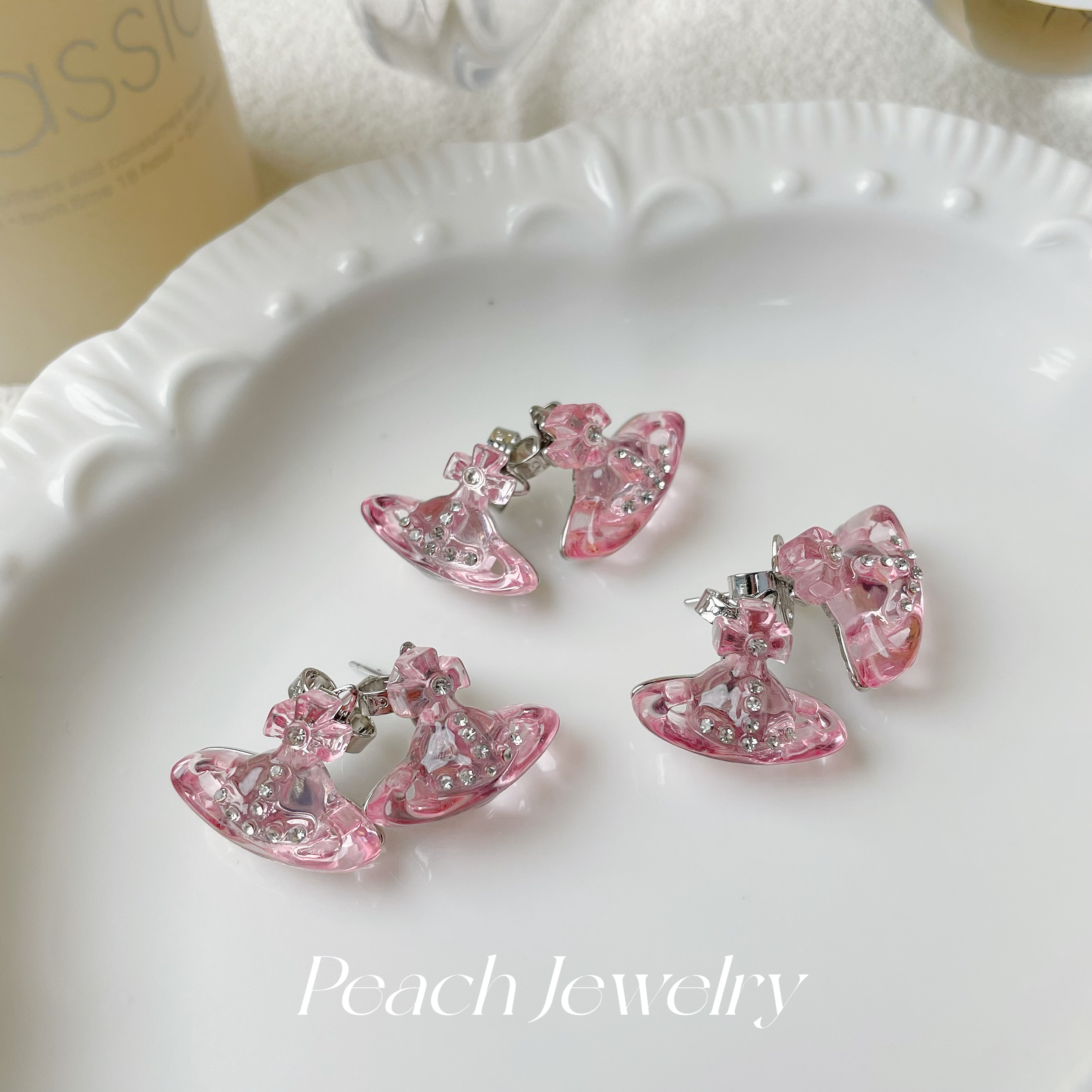 合金树脂耳饰 冰粉色太后土星星球树脂耳钉 TT498 多样性发一对