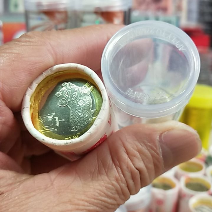 其他普通金属乐*梨流通纪念币生肖猪1卷20枚配币筒1个