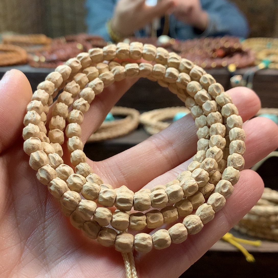 柏香籽/百香籽吊坠粉皮方块单眼双坑