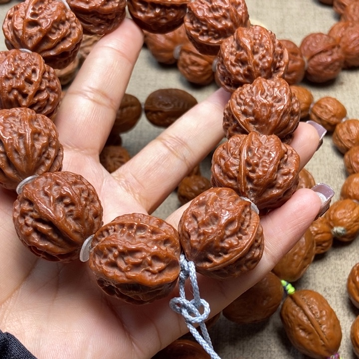 文玩核桃吊坠哈*哈粗筋八棱