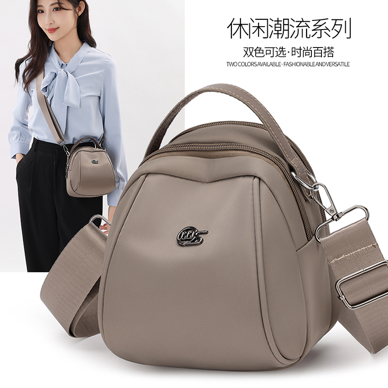 牛津布手提包韩版小背包女2025新款休闲百搭旅行单肩包贝壳妈咪包
