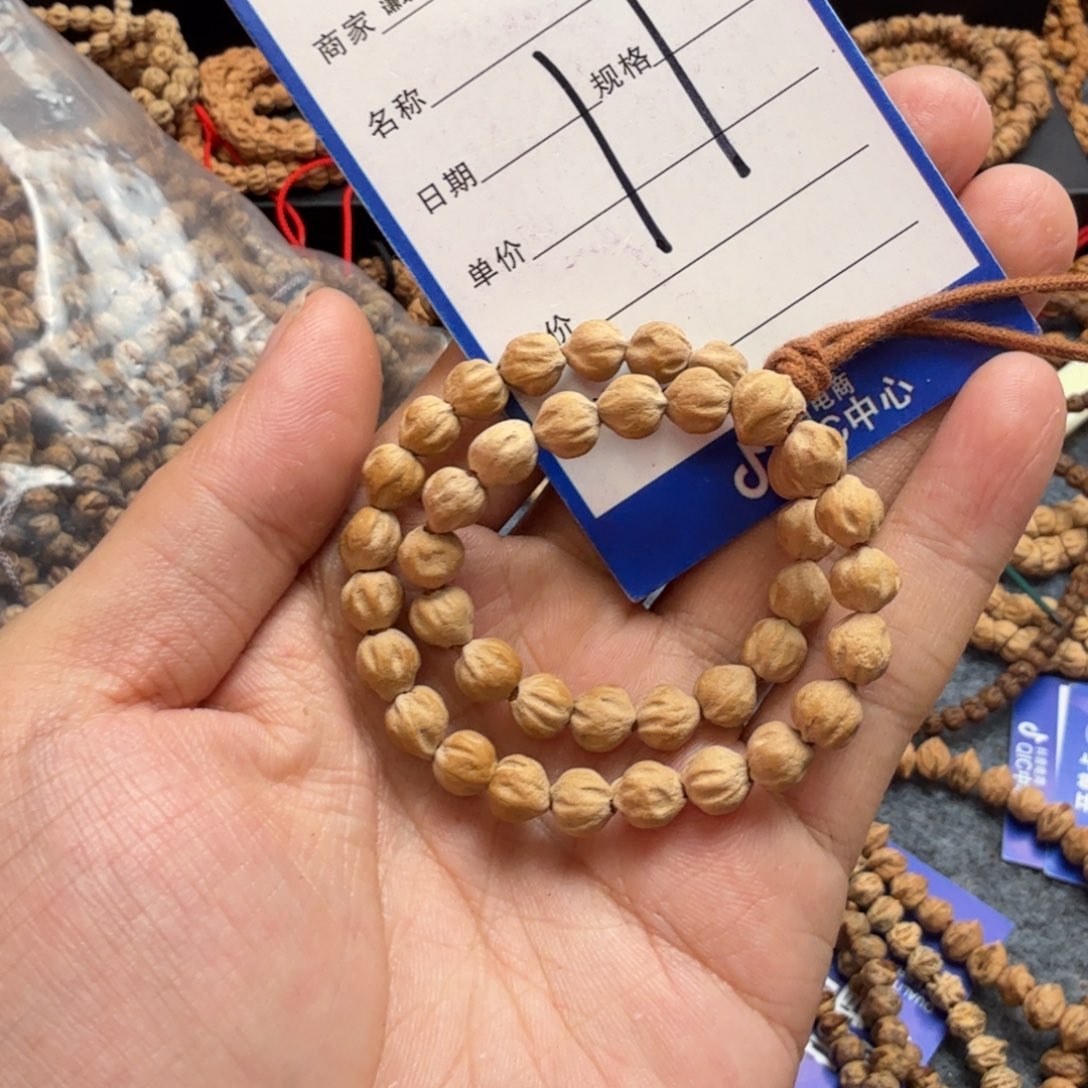 柏香籽/百香籽手串送***马11