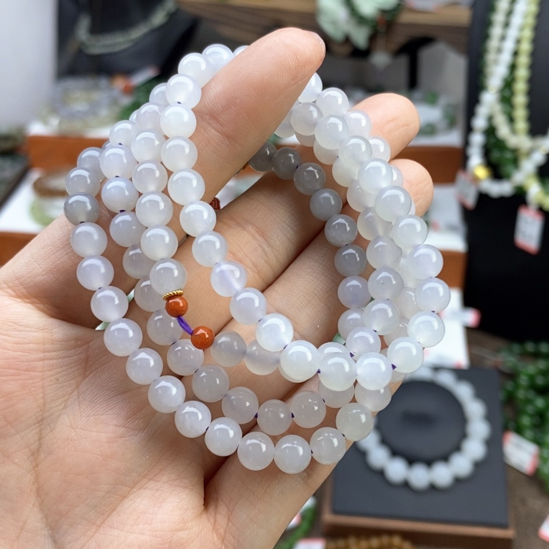 和田玉手串未镶嵌考*?烟紫卡6