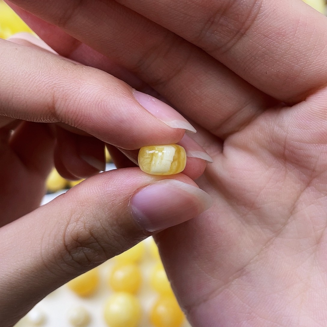 蜜蜡未镶嵌珠宝奇石9.8*6.3mm黄白花墩子微瑕