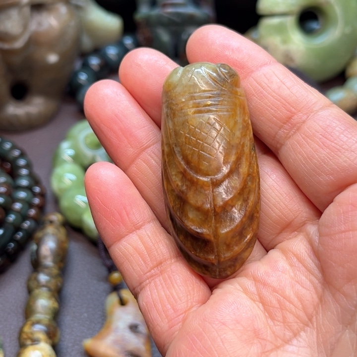 岫岩河磨玉（透闪石质玉）未镶嵌把件潘*鸣