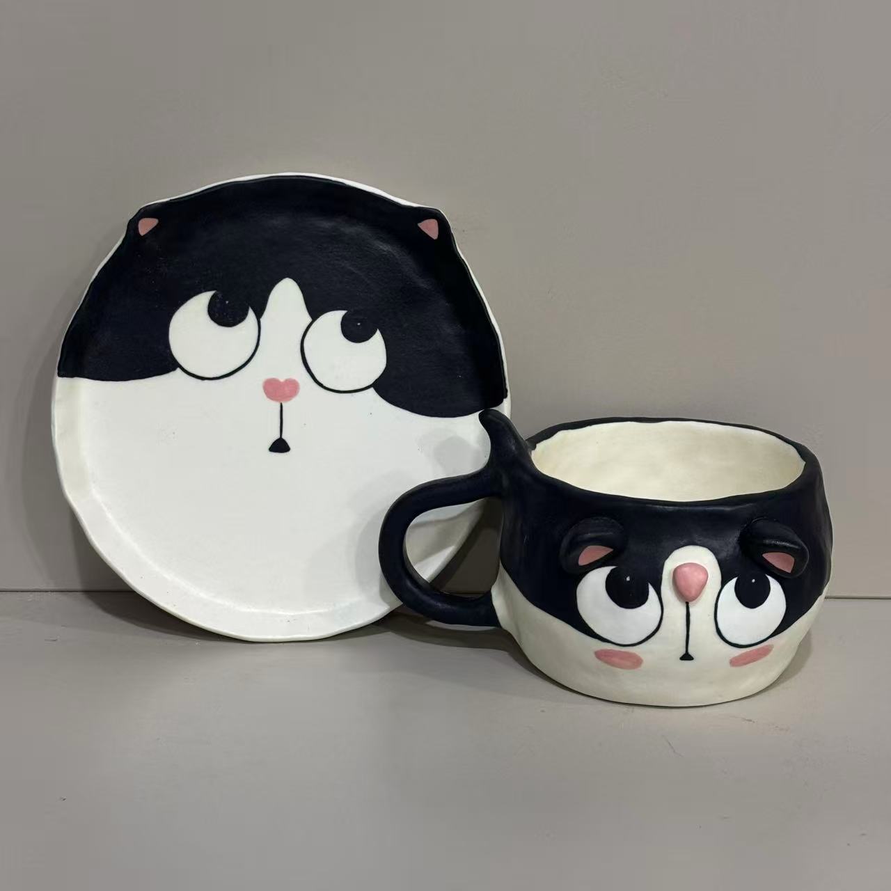 221立体黑白小猫陶瓷杯碟套组