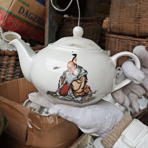 库存微瑕老寿星多孔茶壶