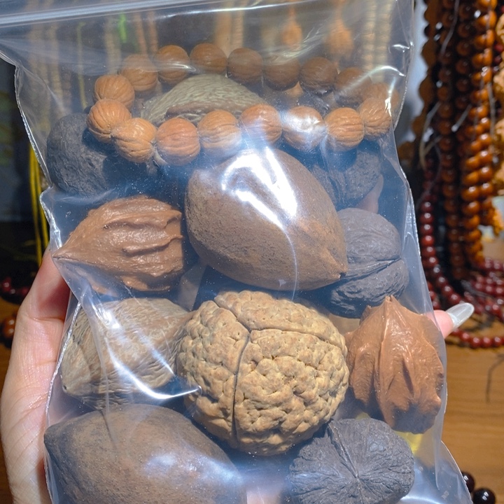 野生大橄榄核手把件