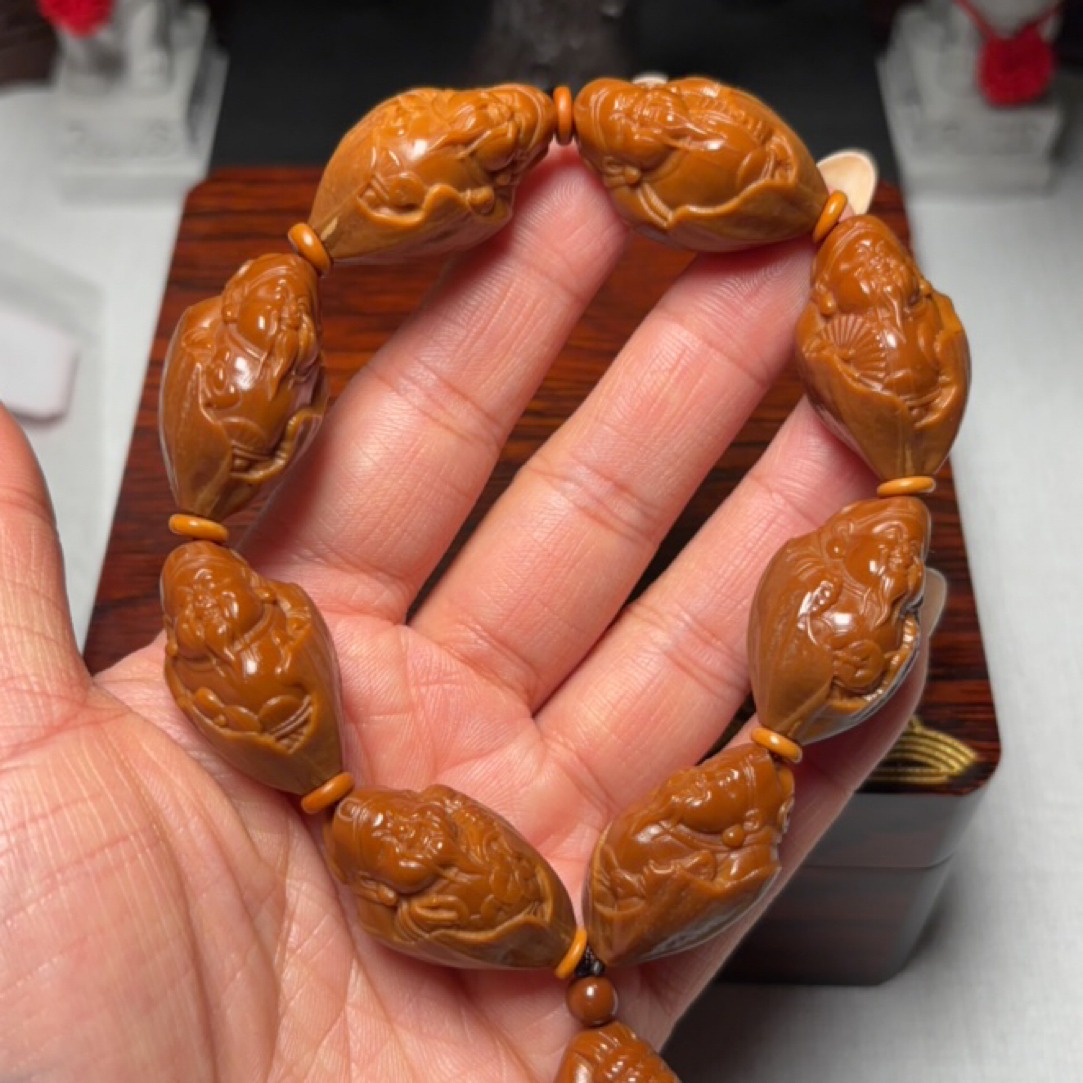 橄榄核雕刻铁核红料元甲财神爷精美包衣1.7文玩手持