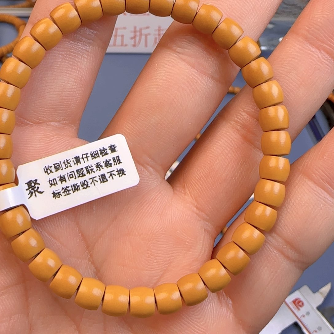 橄榄核手串-***J核尖直切尺寸6.3ss