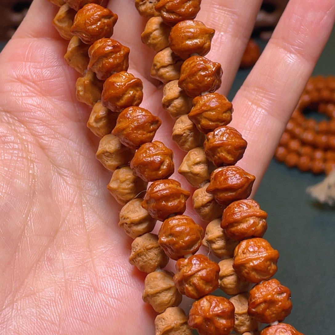 柏香籽/百香籽吊坠白牙横打手持