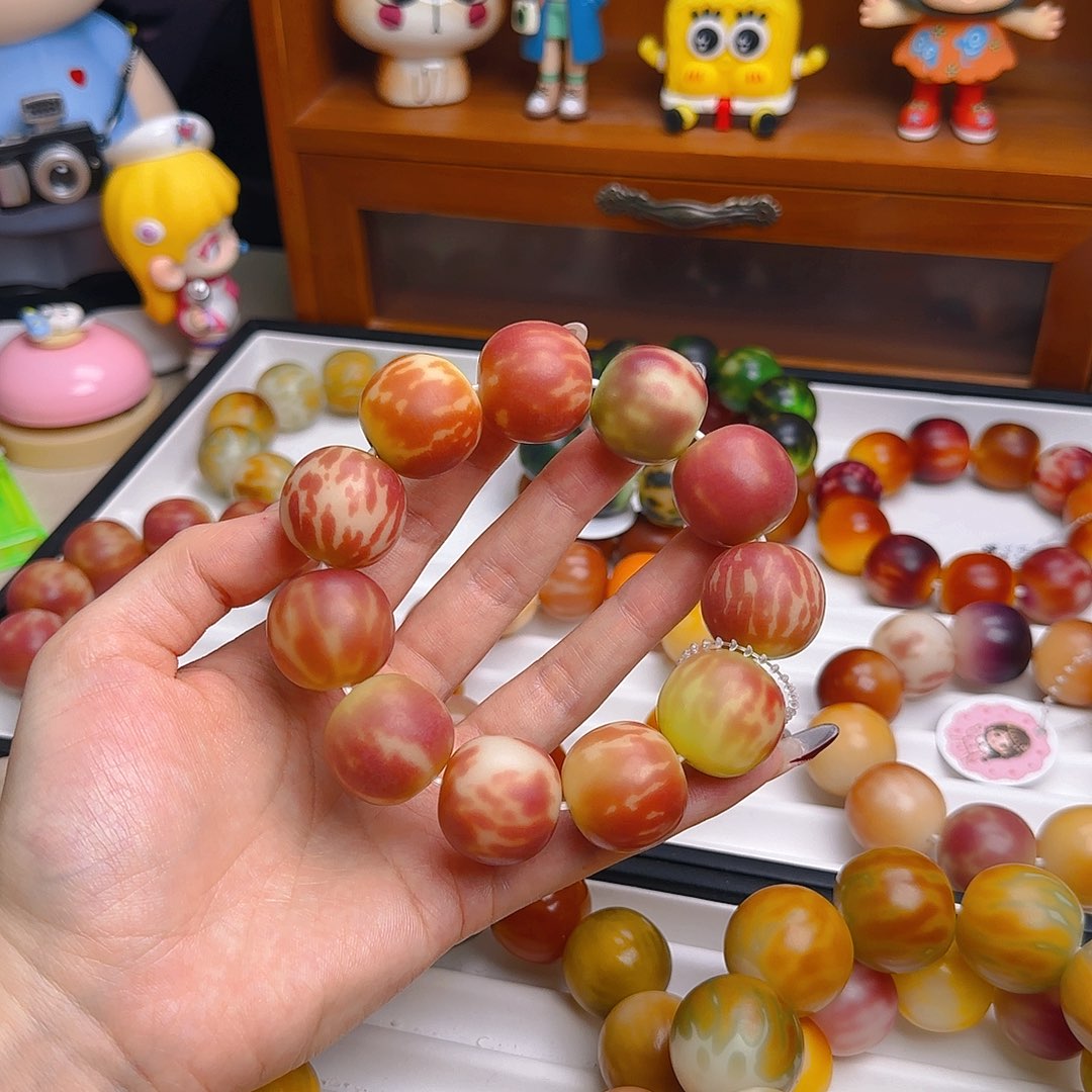墨***o手串菩提根/象牙果卡23干磨苹果微微瑕