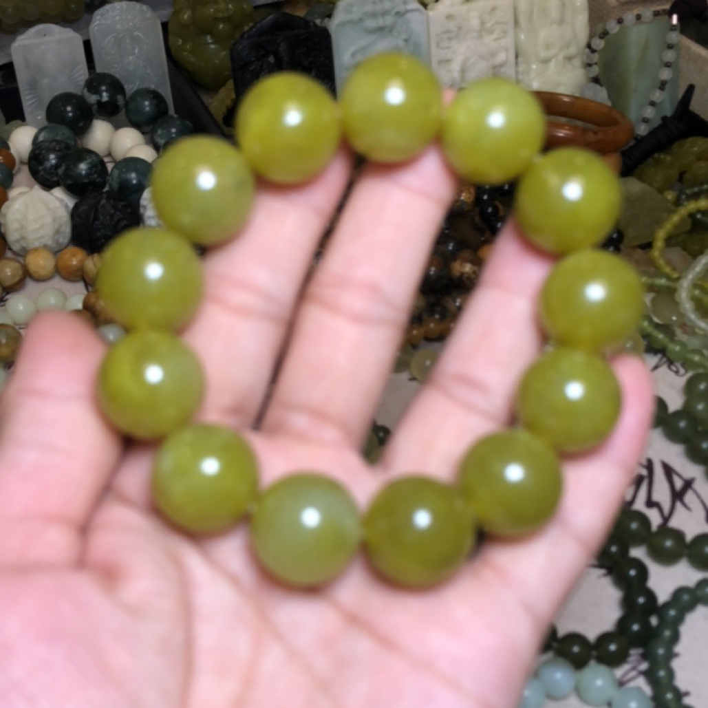 岫玉手串卡16的飘花个别飘墨