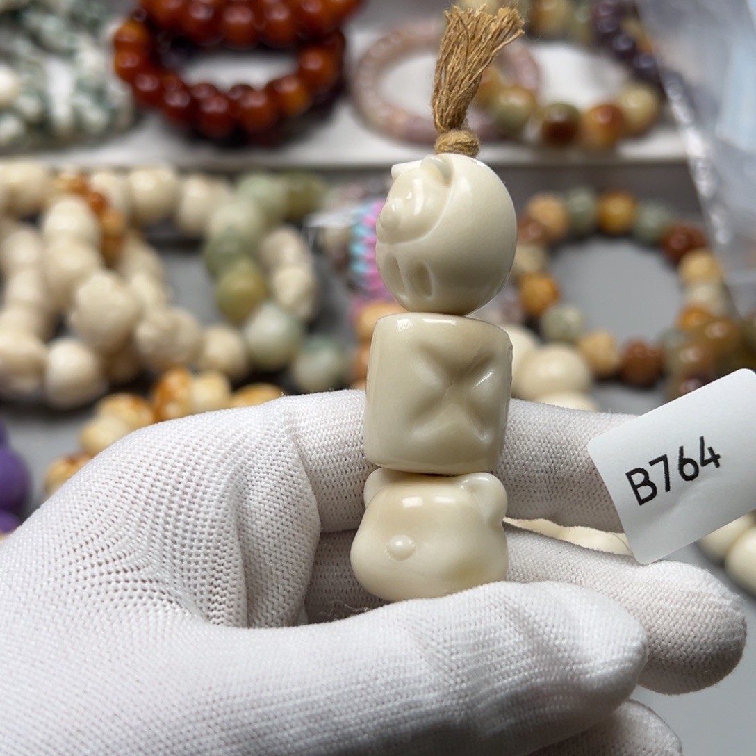 菩提根/象牙果吊坠b764混23-25微瑕一串