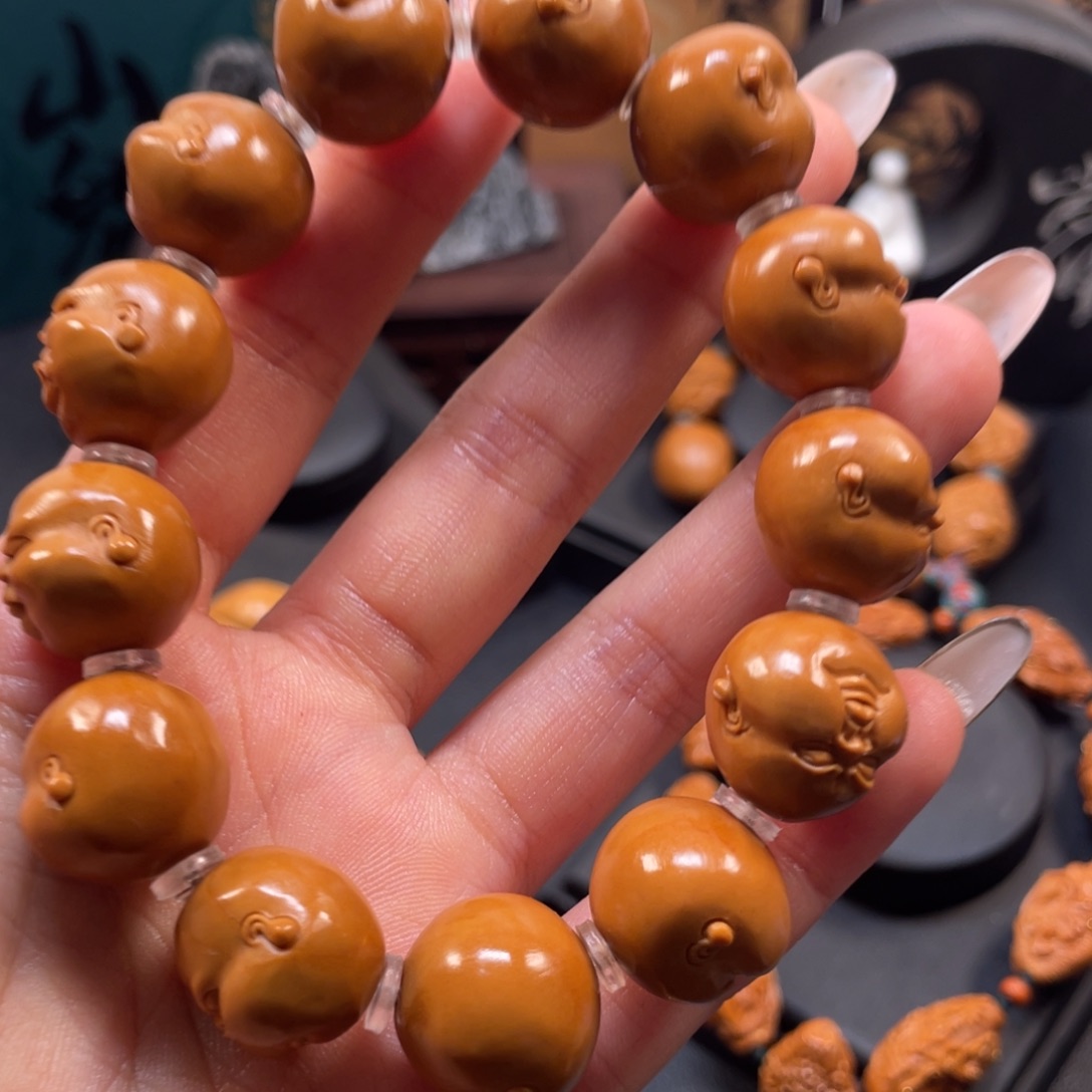 橄榄核吊坠人生百态