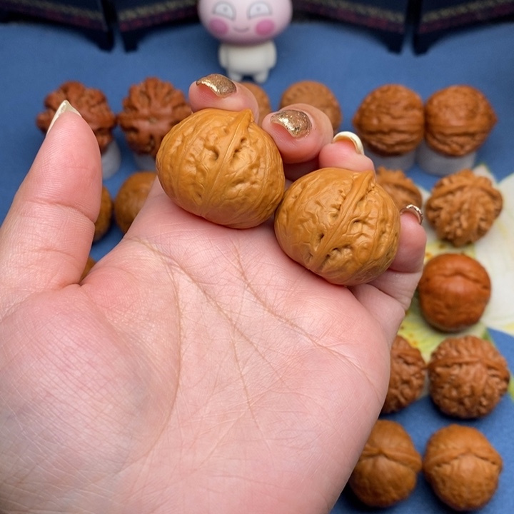 文玩核桃把件鈊**比光皮元宝