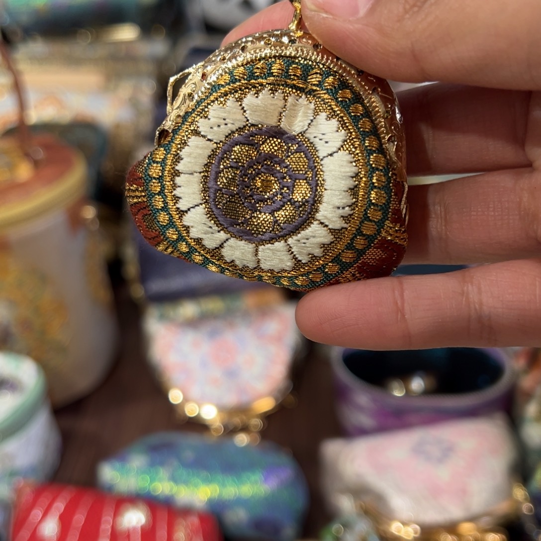 丹***鳯蚕丝小可爱口金福利不退换