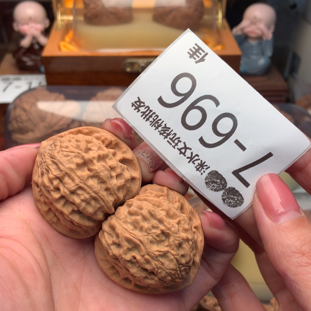 文玩核桃把件40金牛