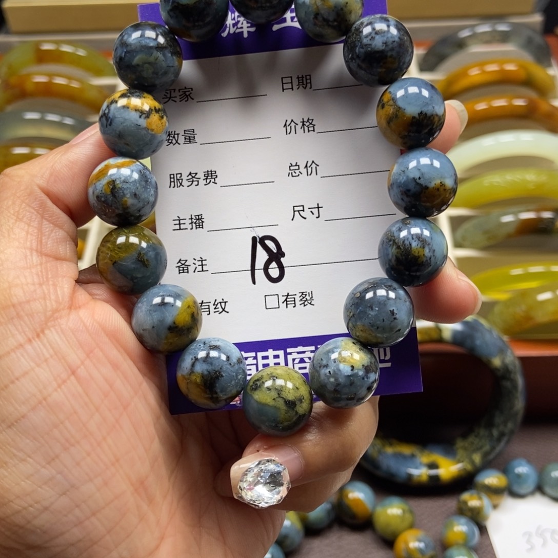 苗***爸未镶嵌蛇纹石玉手串
