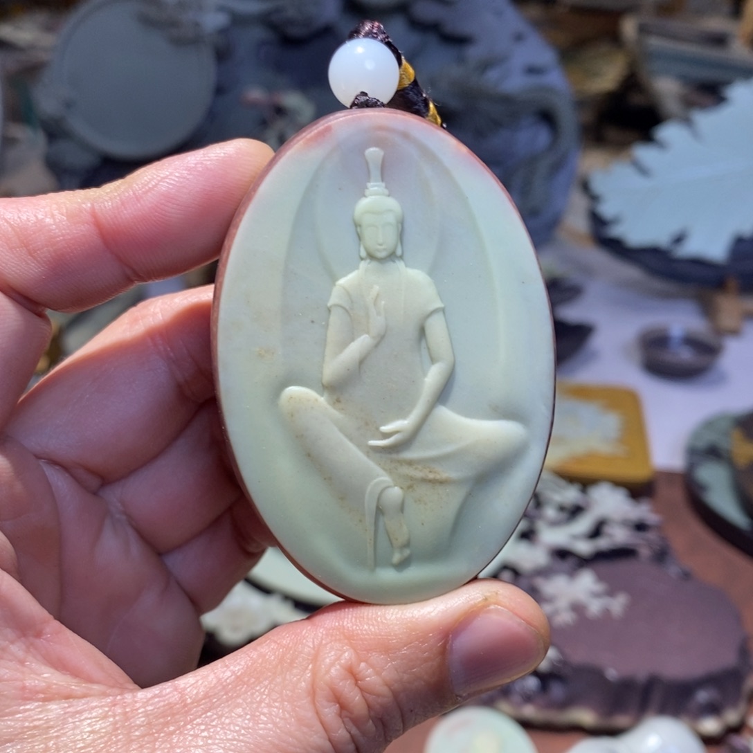 紫袍玉带石观自在手把件