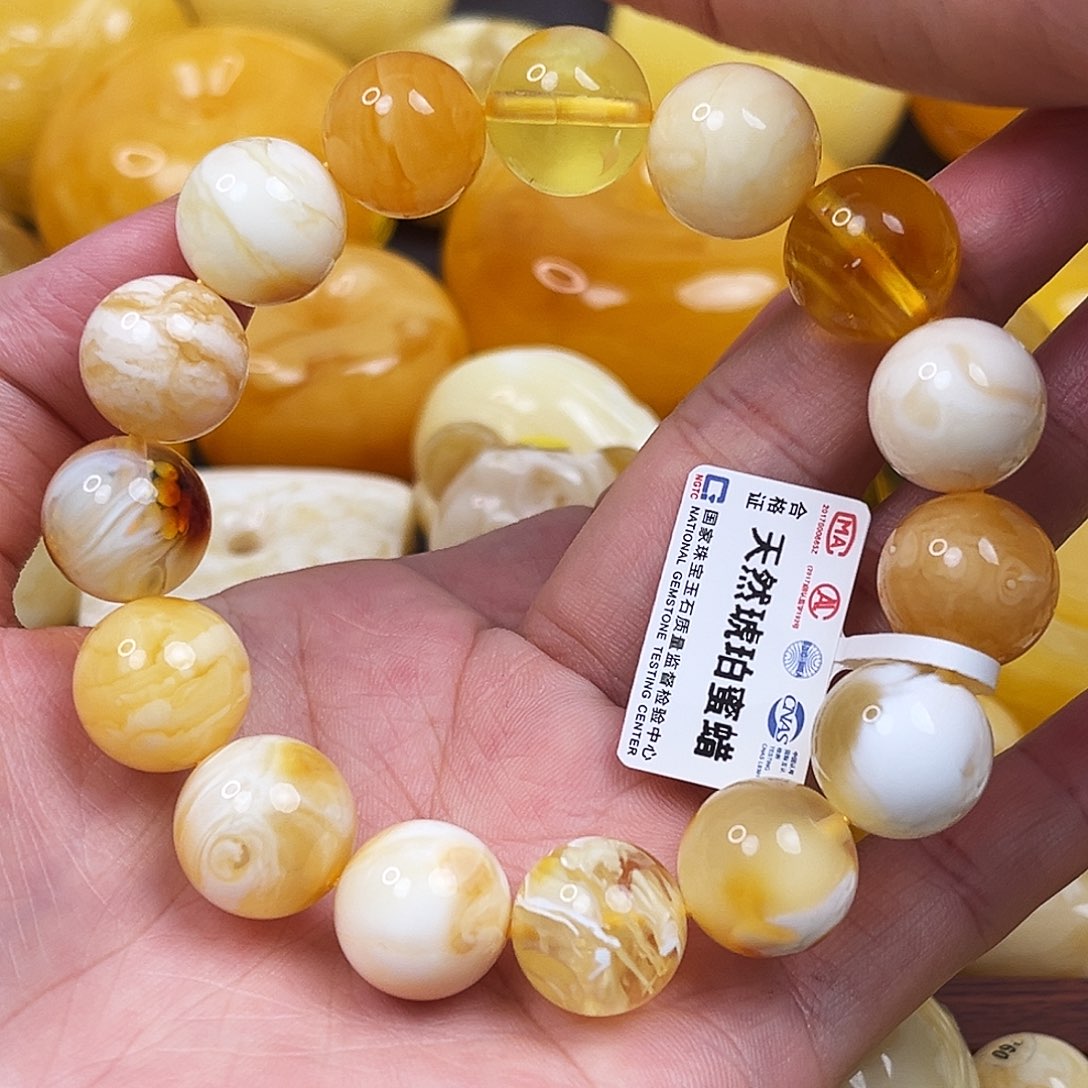 蜜蜡裸石未镶嵌多宝手串