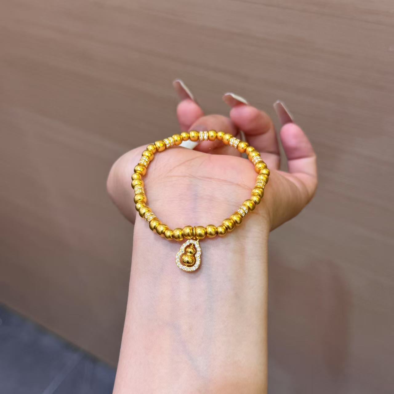 【菠萝珠宝】足金999 镶嵌葫芦珠子手串 金重：17.98克