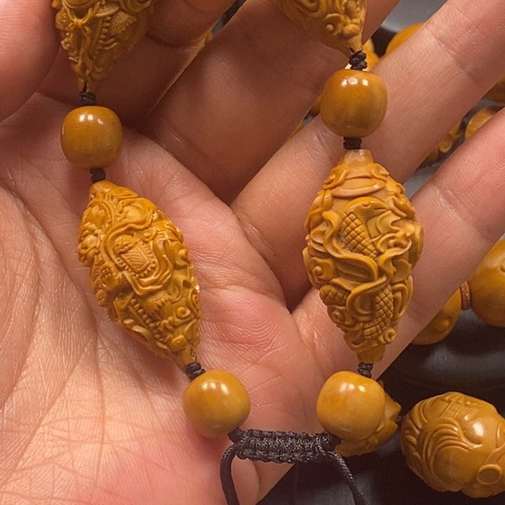 橄榄核吊坠四大天王